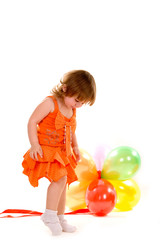 Fototapeta na wymiar happy girl playing with colorful balloons