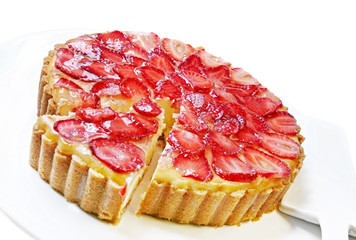 A strawberry cheesecake with a wedge cut out.  