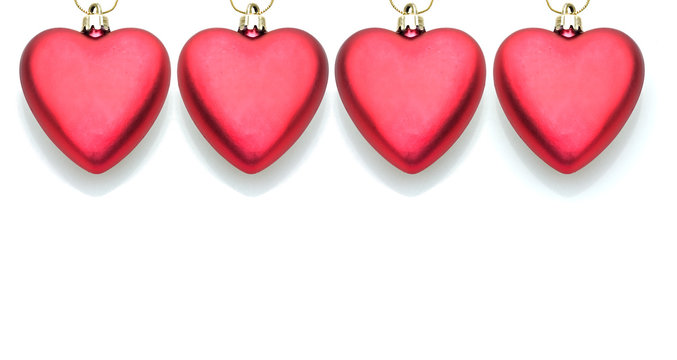four red love hearts hanging in a row