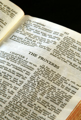 holy bible open to the book of proverbs in the old testament