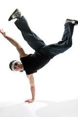 hip-hop style dancer posing on a white background