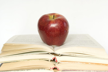 Red apple and stack of books 