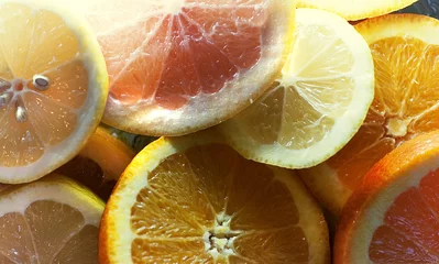 Selbstklebende Fototapeten Scheiben von Zitrusfrüchten © Lemonade