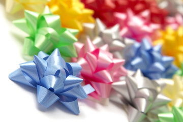 Plenty of colorful bows on a white background