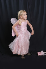little girl with fairy wings -  over white
