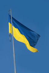 National flag of Ukraine on blue sky