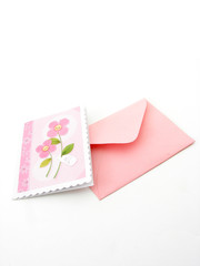 Pink envelope and greeting card