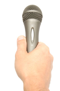 Hand Holding a Microphone