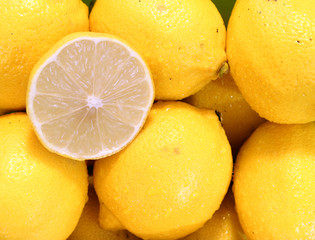 Group of yellow fresh lemons. Macro image..