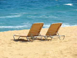 Chaise lounges on the Mediterranean beach