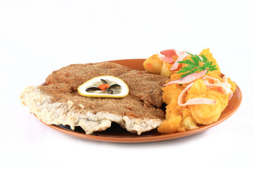 close up of a pork schnitzel in a plate
