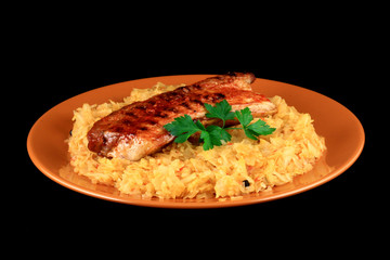 close up of a bacon with potatoes or cabbage in a plate