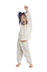 A young child streching as she wakes up.
