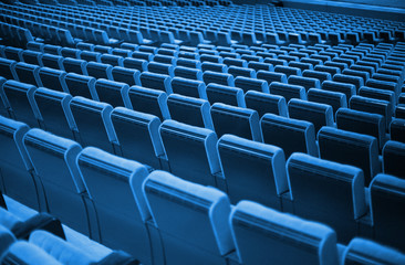 Empty chairs at cinema or theater. Blue Tone