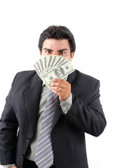 Stressed Businessman hiding behind the money.