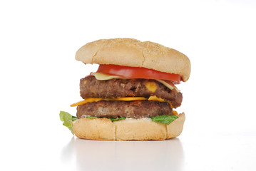 A double decker hamburger on a white background