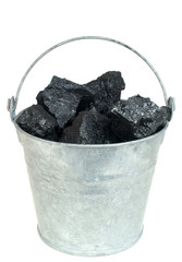 Pieces of coal  in bucket isolated on white background © Marek Kosmal
