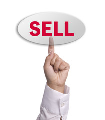 woman hand presses the sell key, isolated