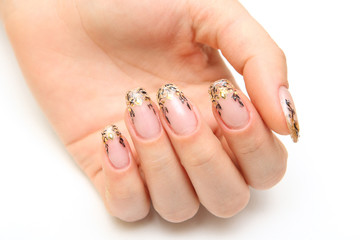 Manicure, women's hands with beautiful drawings on the nails