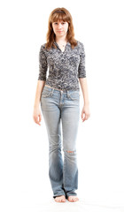 Young girl at the summer clothes isolated at white background