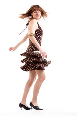 Young girl in summer clothes isolated at the white background