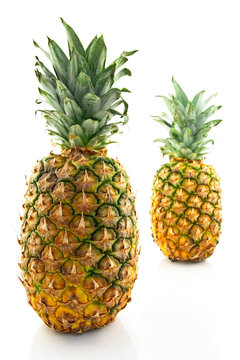 Two ripe pineapples, focus on the closest one. © Studio Light & Shade