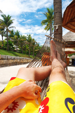 Man In Hammock On The Beach