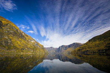 Moutains with reflexion in the water - Fjor in Flam/Norway