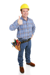Authentic construction worker giving a thumbs-up sign. 