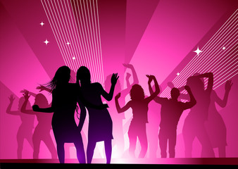 Obraz na płótnie Canvas Girls out dancing in a nightclub having fun.
