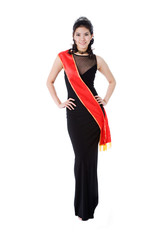 woman friendly smile of a pageant queen wearing red sash
