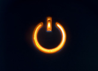 lit power button in orange color
