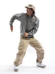 hip-hop dancer posing on a white background