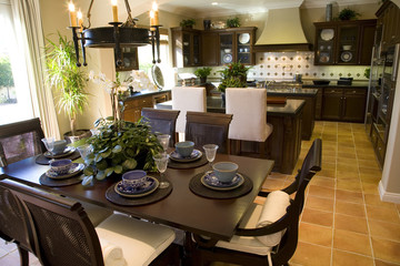 Estate kitchen with breakfast table and decor.