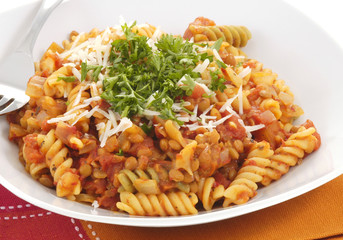 Rotini with plum tomato and lentil sauce.
