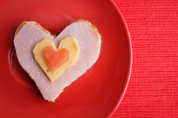 Fototapeta na wymiar Heart-shape sandwich