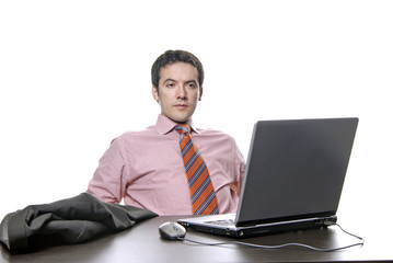young bored business man working with is laptop