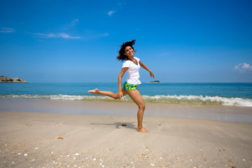 girl running by the beach