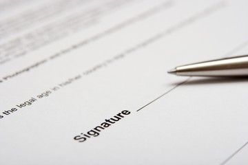 Contract about to being signed with a pen
