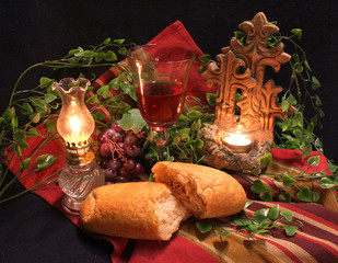 Communion still life - bread and wine with candles