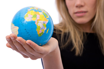 global business concept with a globe and businesswoman