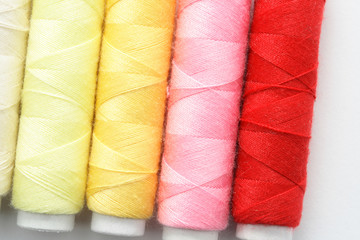 Red, pink, orange and yellow threads