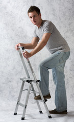 Fototapeta na wymiar Male on Ladder