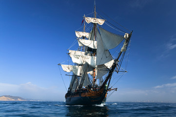 HMS Surprise Sailing Ship at Sea under full sail