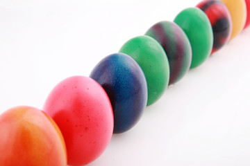 colorful eggs on white as a symbol for easter
