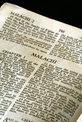 holy bible open to the book of Malachi in the old testament