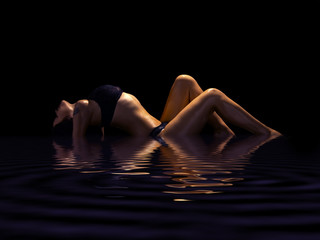 seductive brunette in underclothes isolated on black background