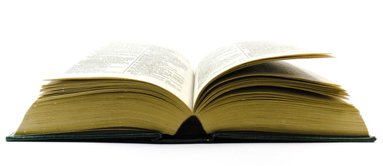 old open dictionary over white background