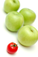 red tomato and green apples