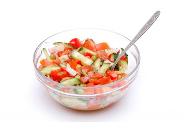 Tasty dietary salad from tomatoes, cucumbers and radish